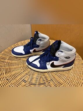 Nike Air Jordan’s Kids White, Blue & Black High-Top Sneakers with Orange Trim